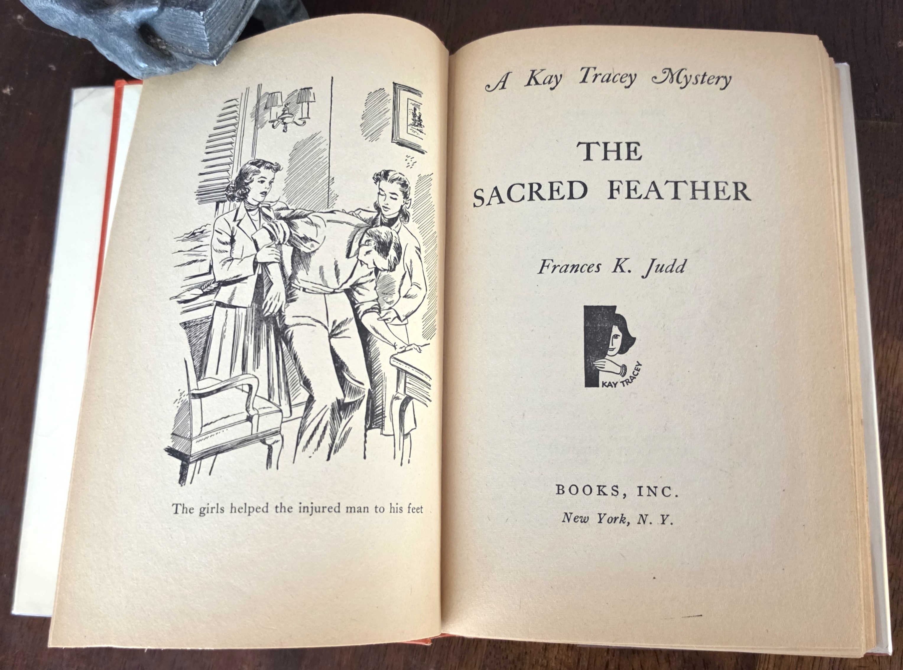 Image for The Sacred Feather (Kay Tracey Mystery Stories) The Sacred Feather (Kay Tracey Mystery Stories)